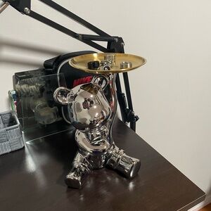 Bear stand with plate. Display, decoration, room